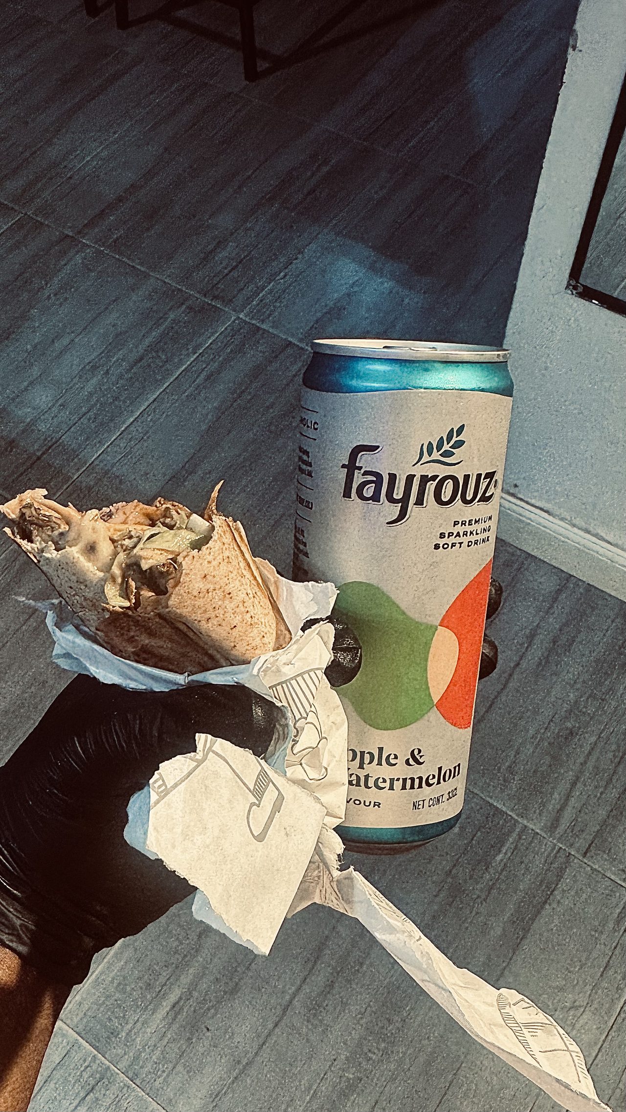 Chicken wrap served with a chilled sparkling drink