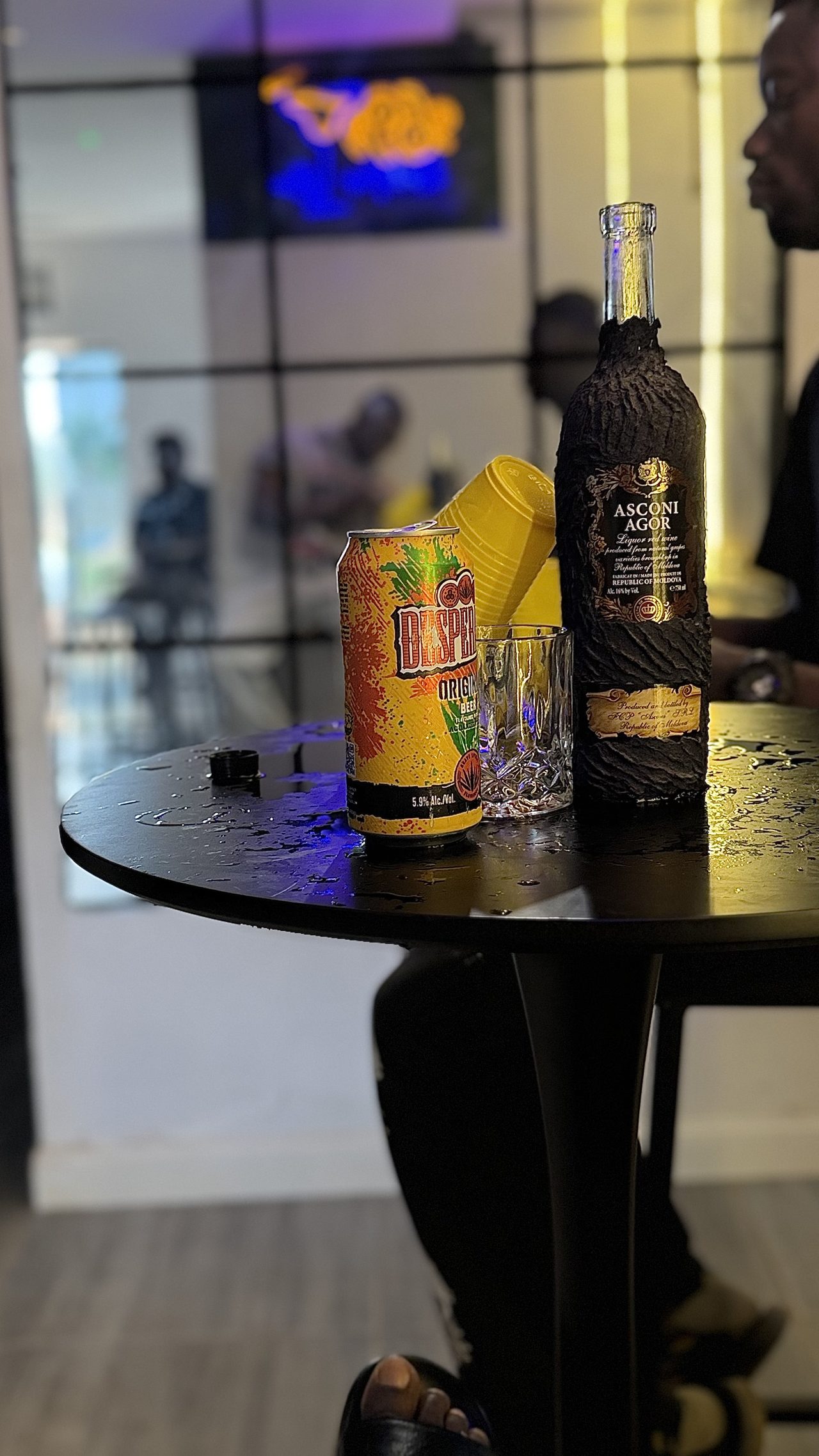 Beer and a bottle of wine on a table in the lounge